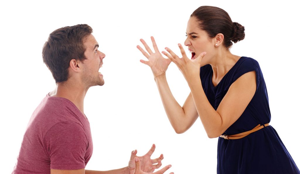 Image of a man and a woman verbally fighting